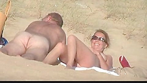 Hot amateurs enjoying sex on a sandy public beach Hot amateurs enjoying sex on a sandy public beach